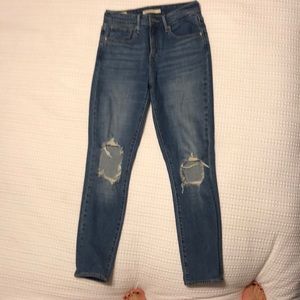Levi’s highrise skinny ripped knee jeans
